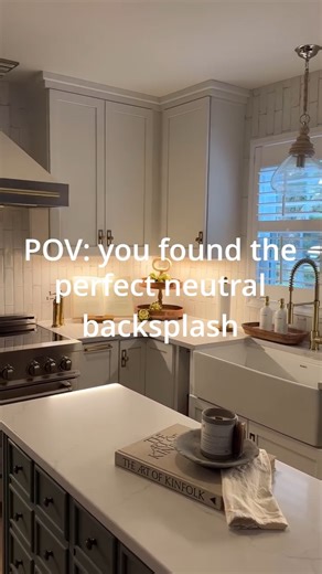 Bright, clean, and full of character, this Storied Cotton White backsplash by @newrivercabinets transforms the heart of the home into a space of timeless style 🤍 #WhyTile #FloridaTile #KitchenDesign | Florida Tile