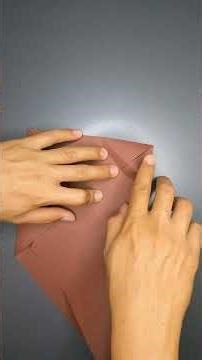 Folding paper to make an envelope