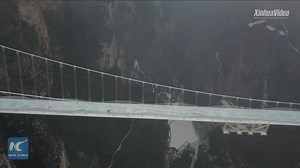 12K views · 770 reactions | Heavy snow gives stunning beauty to the world's longest and highest glass bridge. The six-meter-wide bridge stretches 430 meters over a 300-meter deep canyon in China's Zhangjiajie, which is said to have inspired the scenery for the sci-fi "Avatar." | China Xinhua News | Facebook
