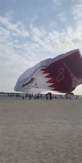 14K views · 255 reactions | #Video: Watch the world’s #largestkite launches into the Qatari skies. The 66-metre-long and the 40-metre-wide kite is made in the colours of the #Qatar National Flag and features the picture of the Amir HH Sheikh Tamim bin Hamad al Thani. It was launched in the presence of Guinness World Records officials. | Qatar Tribune | Facebook