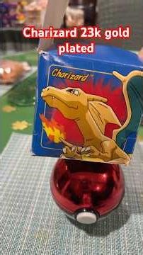 1999 Pokemon Charizard 23k gold plated.