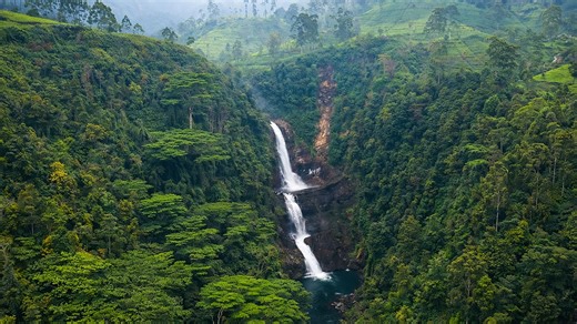 A remote waterfall surrounded by unreachable terrain