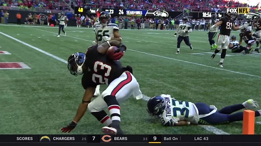 Brian Hill weaves through 'Hawks D for 23-yard TD run