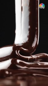 #BehindTheLabel | A story of survival, not sweetness, began with Hershey’s unexpected role in World War II. In 1937, the U.S. Army approached the company to develop a 'D-ration bar'. Shibani Gharat takes us through the story of what transpired at Hershey's amidst one of the biggest conflicts in global history. #Watch #chocolate #hersheys #worldwar2 #US #usarmy #cnbctv18digital | CNBC-TV18