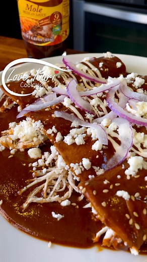 How to Make Enmoladas Enchiladas de Mole Recipe. If you love mole like I do, Enmoladas are a dream come true 😋 These rich and delicious Chicken Mole Enchiladas feature fried tortillas smothered in a savory mole sauce. They're incredibly delicious! 🥰 Please comment down below what recipe you will like to see next. Also, check out our YouTube Channel for more delicious recipes. Link in Bio 😊 ENMOLADAS INGREDIENTS: For the mole sauce: ► 1 roma tomato ► 3 garlic cloves ► 1/2 white onion ► 1 torti