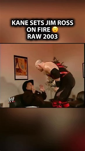 Carlo Pastena on Instagram: "Kane setting JR on fire was WILD 🔥 This was one of the segments I witnessed as a kid. Poor Jim Ross man… when Kane first unmasked, he was a menace 😂 #wwe #kane #wwe #jimross #ruthlessaggression"