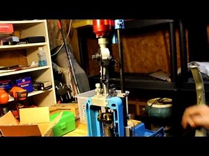 Dillon 550 with lee autodrum powder measure.