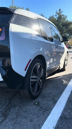 BMW i3 REx sound from outside and parked next to a wall