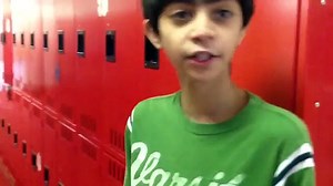 Kid breaks computer in School Hallway!