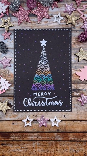 Ilona Regnery ✶ Lettering & Card Artist on Instagram: "MERRY 💜💚✨ Colorful Christmas card, quick & easy with acrylic markers 💫 This festive tree design is perfect when you’re short on time! You’ll need: black cardstock (A6 or 4” x 6”) or a folded black card, fine-nib acrylic markers, and some washi or masking tape (I used a sandblasting stencil film called Oramask 831). Some of the pens I use are only available in Germany/Europe, but there are great acrylic markers worldwide, like the ones fro