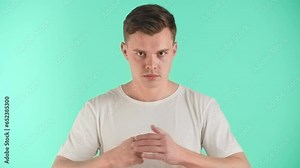 Angry man demonstrate negative emotions, indignation, ire, unfriendliness and hostility. Guy shows bad mood, angry and ready to the attack and fight. The guy demonstrates courage and power to