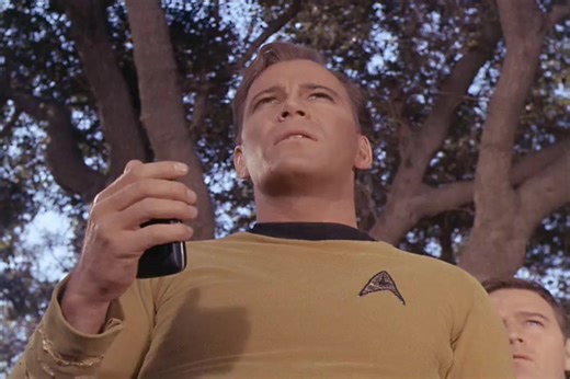 Starfleet Records. Starfleet Personnel: James T. Kirk, Captain of the USS Enterprise NCC-1701. What is happiness? Stardate: 3417.3-3417.7 (2267) Spock is laughing and clowning around hanging from a tree. When Kirk orders Spock to be placed under arrest, the Vulcan leads Kirk and his officers a short distance, stopping in front of one of the spore plants. Immediately, the spores blast Sulu and Kelowitz, who both exhibit the same euphoric behavior of the people on the planet. Meanwhile, DeSalle, a