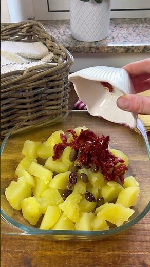 Tasty potato salad with dried tomatoes, eggs and olives #ilcaldosaporedelsud