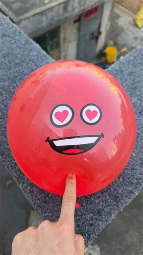 Experiment: Will a water balloon explode if it rolls down a tall building? 💥🎈 #balloon