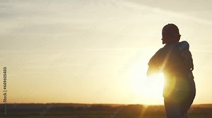 boy run. kid kid running a across the field in the park silhouette at sunset. happy family people in the park. boy run silhouette. fun happy childhood summer freedom concept. kid run