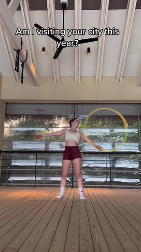 Hula Hooping Performance in Modern Indoor Setting
