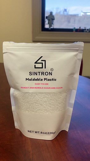 WVATS AT Champion Mark showing how Instamorph can be a great resource for accessibility! #ATforEveryone #AssistiveTechnology #Accessibility Video Description: A bag of white plastic beeds is shown and turned to show the directions of how to use moldable plastic. A mug containing the beeds is placed under a Keurig for hot water. Once the hot water fills the mug, the plastic beeds go from white to clear. Mark is then shown manipulating the plastic to fit around a house key.