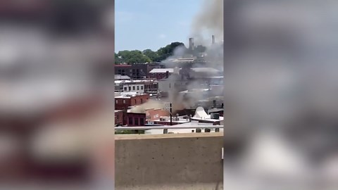 Large fire burns through Richmond building, two firefighters hurt in extreme heat