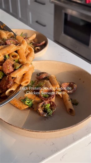 Smoky Andouille Chicken Sausage Pasta — the easiest weeknight dinner that tastes amazing and leaves you feeling so satisfied 🤤 ‌ Comment ‘PASTA’ below and I’ll DM you the link for the recipe - make sure you’re already following me to get the message ❤️🍝 ‌ Hayesie loved this one too & I felt so good about it because he gets protein veggies in there too. So easy to reheat in a skillet the next day for lunch or another dinner | Rachael's Good Eats