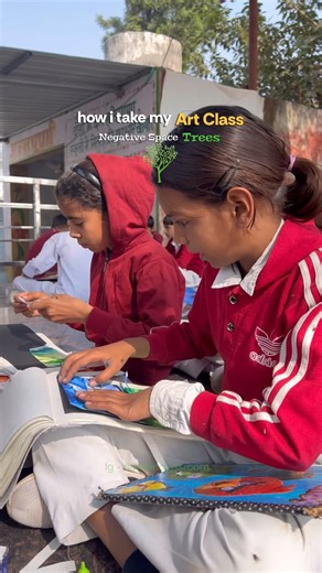 Naveenclassroom on Instagram: "✨ Today’s Art Class – Negative Space Tree Art ✨ In today’s class, the students learned how to create Negative Space Tree Art. We began by using oil pastels and watercolours to paint a colourful landscape background with smooth gradients, bright skies, and textured fields. Once the background was ready, the students created a tree silhouette cut-out, which they carefully pasted onto a black sheet. Through this process, they understood how negative space can add dept