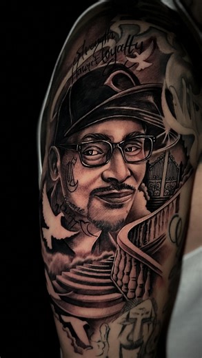 Smiles tatts on Instagram: "A memorial piece for my guy Gilbert who’s brother passed on. With this tattoo, I’m sure he will never be forgotten 🙏🏽 Thank you for looking. For Booking Txt: 916-670-4862 Shop: @sacredarrowstudio 7456 Foothills Blvd., Roseville CA 95747. Artist: @smiles_tatts (DMs Open) _______________________________________ #sacramentotattooartist #sacramentotattooshop #rosevilletattooartist #memorialtattoo #tattooportrait"
