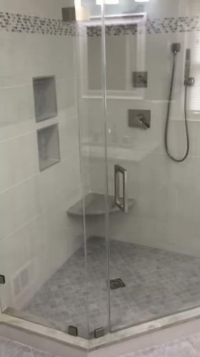 Neo-angle frameless shower