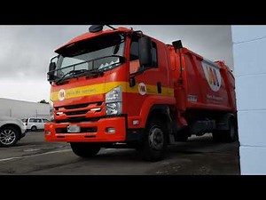 Waste Management - Close-up Packer Action - Rear Lift / Rear Loader Rubbish Truck