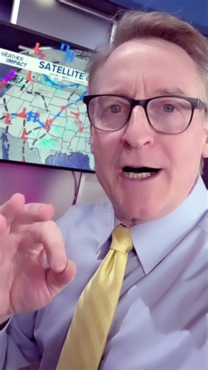 Mark Johnson checks out a messy weather map