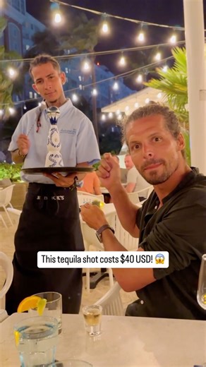 🇦🇼 Didn't know tequila shots could be this expensive! 😱💰 Tried one of the most expensive shots of tequila on the beach in Aruba at Hadicurari Restaurant. 🥃 This clasic Mexican tequila is served with a fun little show as the waiter comes out with the beautiful bottle of Clase Azul and rings a bell. ❤️🇦🇼 #tequila #drink | Traveltomtom