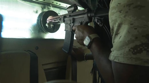 Police vehicle on patrol in Port-au-Prince comes under attack by gangs