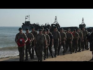 British Marine commandos land on Gold beach for D-Day commemorations | AFP
