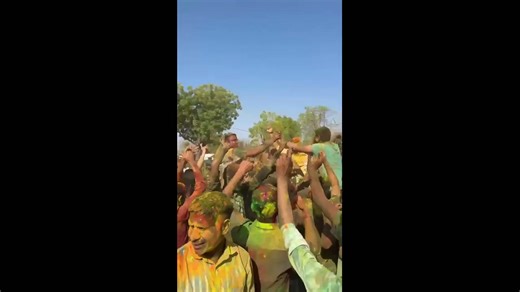 Ravindra Singh Bhati celebrates Holi with police personnel in Barmer, India