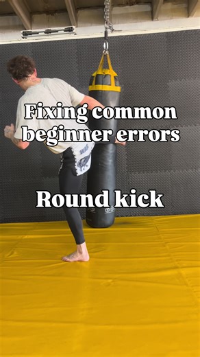 Fixing common errors: round kick. Bringing the leg around to wide and bouncing it off the bag wide. Bring it up straighter and down in a straight line