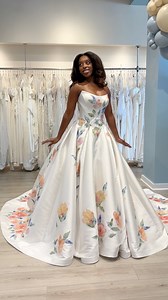 ✨ Exclusive New Arrival ✨ This beauty can only be found here at Belle Amour Bridal, and she’s already stealing hearts. With her sweeping ballgown silhouette, structured strapless neckline, and the most breathtaking hand-painted floral embroidery, she’s a true work of art. 🌸🎨 Every detail is designed to make a statement—whimsical, romantic, and unforgettable. Now the fun part—what should we name her? We’re thinking Poppy… ☺️🌸 Drop your ideas below! | Belle Amour Bridal