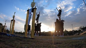 Local coach helps shape strong girls while creating dynasty