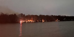 Crews use boat, hand tools to battle large brush fire along Rock River