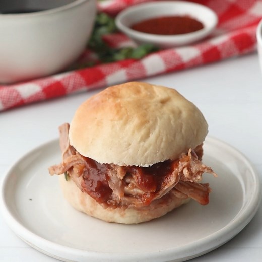5.5K views · 23 reactions | low Cooker Coca-Cola Pulled Pork with Coca-Cola BBQ Sauce Recipe – our go-to recipe for pulled pork with only 2 ingredients! The homemade barbecue sauce puts this pork over the top! Leftovers are great on a salad, in tacos or NACHOS! YUM! GET THE RECIPE: https://www.plainchicken.com/slow-cooker-coca-cola-pulled-pork-with/ | Plain Chicken | Facebook