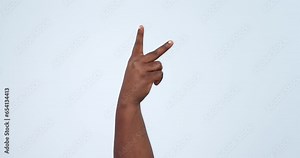 Two, hand and peace sign in studio with freedom, counting or emoji gesture with number. Count, finger and arm of a person with greeting, vote and v letter with blue background and happy icon