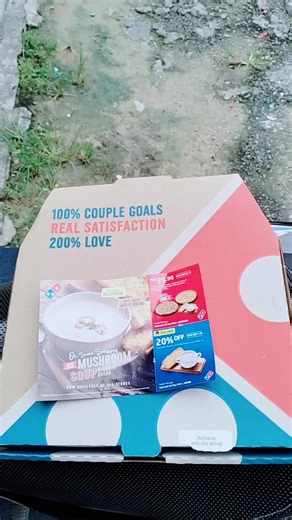 Exploring Domino's Pizza Box Contents in Close-Up Shots