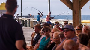 Worshipers gather at the Apache Campground Pier on Sunday mornings for a church service as waves break beneath and fishermen cast their lines. Churchgoers gathering at this unique location shows how some congregations are thinking outside the steeple to spread the Gospel as Protestant churches lose thousands of members each year across the state. Full story here >>> https://bit.ly/2AWviUn | The Sun News