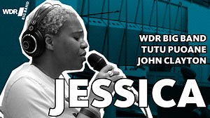 Here's clip from 2022, when we got to spend a week with our old friend John Clayton and our new friend Tutu Puoane. "Jessica" is a ballad by Marcus Wyatt with lyrics by Jelena Jovovic. This beautiful arrangement by John Clayton features Tutu Puoane on vocals, Ludwig Nuss on trombone and Raphael Klemm, also on trombone. Recorded live in Studio 4, conducted by John Clayton. -------------------------- Hier ein Clip vom 2022, als wir eine Woche mit unserem alten Freund John Clayton und unserer neuen