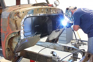 Repairing a damaged floor and firewall on a Chevy truck