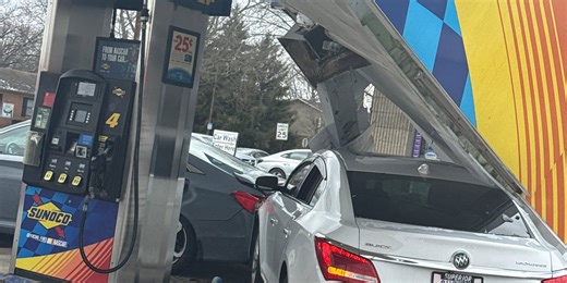Woman choking on french fry crashes into gas station awning, causing partial collapse