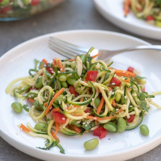 This ASIAN ZUCCHINI NOODLE SALAD with a Ginger Sesame-Soy Dressing is a vibrant, wholesome choice to add to the menu for your next summer gathering. It makes for a delicious side dish or add grilled chicken or shrimp to make it a meal. GET THE RECIPE: https://www.fromvalerieskitchen.com/asian-zucchini-noodle-salad/ | Valerie's Kitchen
