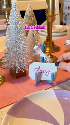 ✨ Candy Cane Placeholders for Christmas Dinner! ✨ Turn candy into the cutest table décor! Just glue 3 candy canes together near the top (glue dots work perfectly!), tie a festive ribbon around the glued spot, then flip them hook-side down so they stand up like a tiny easel. Add your name card on top and you’ve got the sweetest little placeholder for your Christmas table. 🍬🎀 Simple, adorable, and guaranteed to make your guests smile! 🎄❤️ #christmasparty #christmas2025 #christmasdinner #placeho