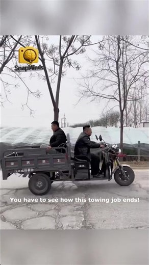 EPIC Towing FAIL! Watch This Tricycle Lose Its Back Wheel!
