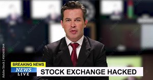 News presenter reading breaking news