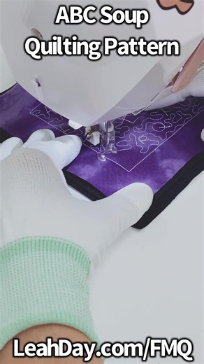 Free motion quilting ABC soup. Gotta watch out for where you end up after stitching a letter. Thankfully Stippling is the perfect connector design! Find hundreds of quilting tutorials and fun creative designs - LeahDay.com/FMQ #quilting #freemotionquiltingproject #leahdayquilting #freemotionquilting #machinequilting #machinequilter #ilovequilting #quiltingfun #quiltingfriends #quiltingidea #quiltingtutorial #quiltingtoday #quiltingpatterns #quiltingdesigns #quiltinglife #quiltingisawesome #quilt