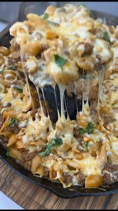 Cheesy Enchilada Hamburger Helper One pan, cheesy, saucy, and full of beefy enchilada flavor. It tastes like boxed hamburger helper but way better. My family loves this one and my kids are always asking for the cheesy enchilada pasta, so it is perfect for a quick reel from the sizzling beef to that final stretchy cheese stir. Ingredients: 1 lb ground beef 1 small yellow onion, finely diced 2 cloves garlic, minced 2 cups uncooked small pasta (elbows, shells, or rotini) 1 can (10 oz) red enchilada