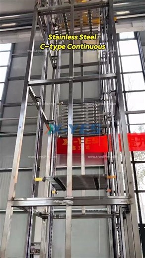Vertical Conveyor System in Operation | Customized Material Handling Solution